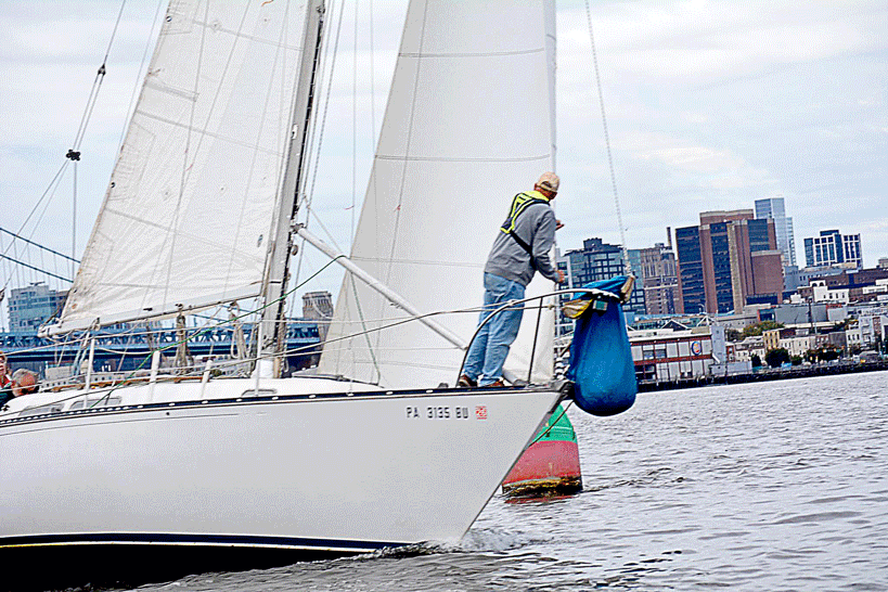 Racing sailor at the bow